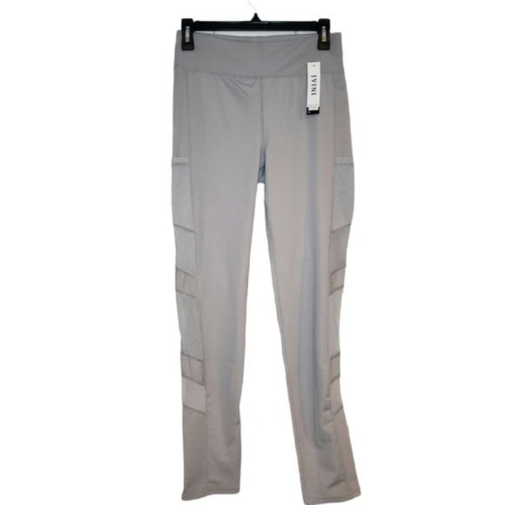 NWT JVINI gray leggings‎ with sheer side pa…